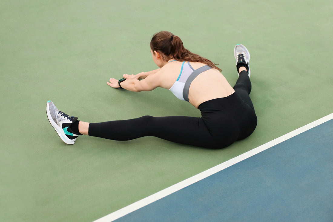 Femme pratiquant une posture de yoga